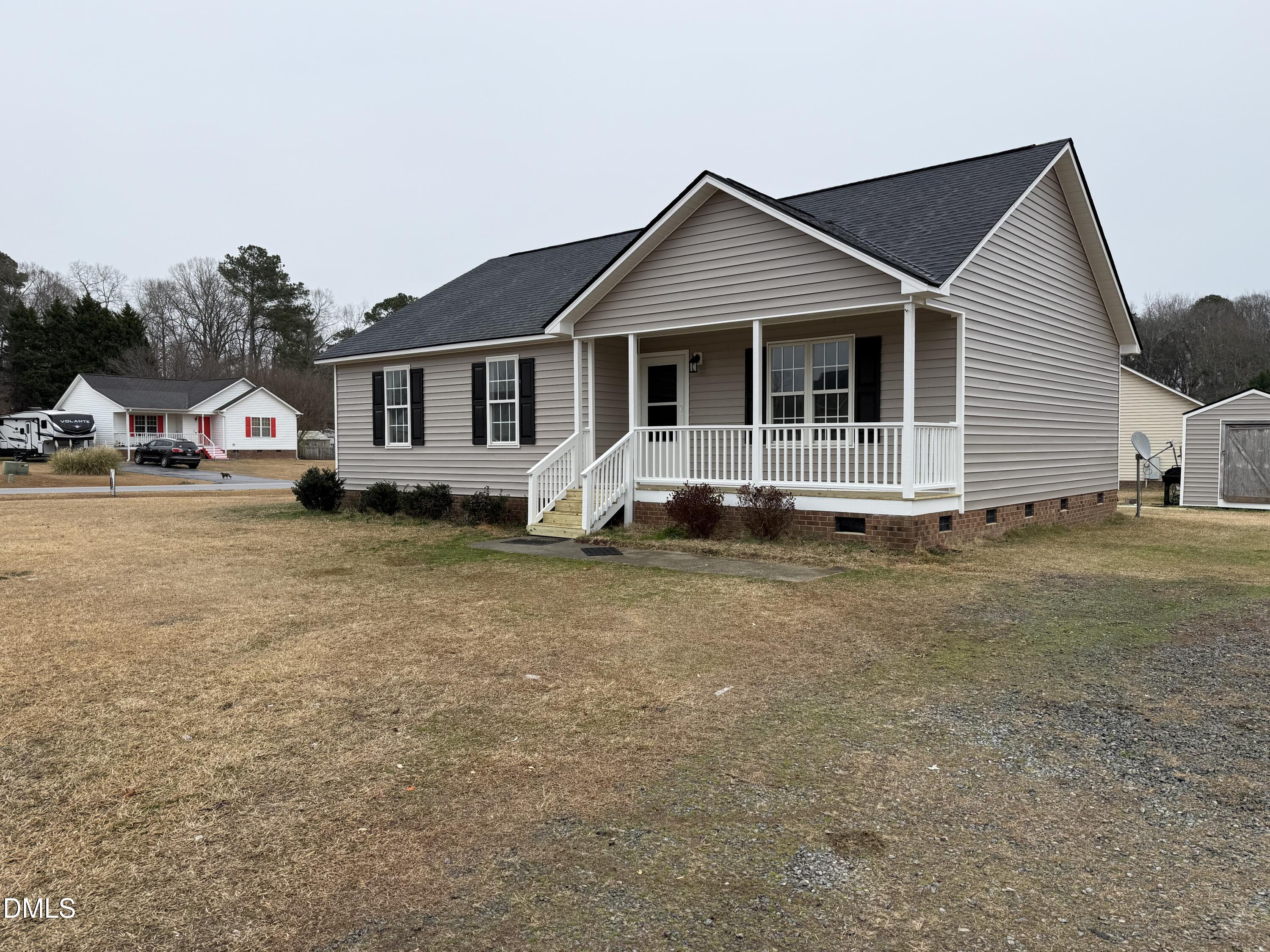 101 Copper Stone Street Smithfield, NC 27577 - Photo 13 of 32 a view of a house with backyard