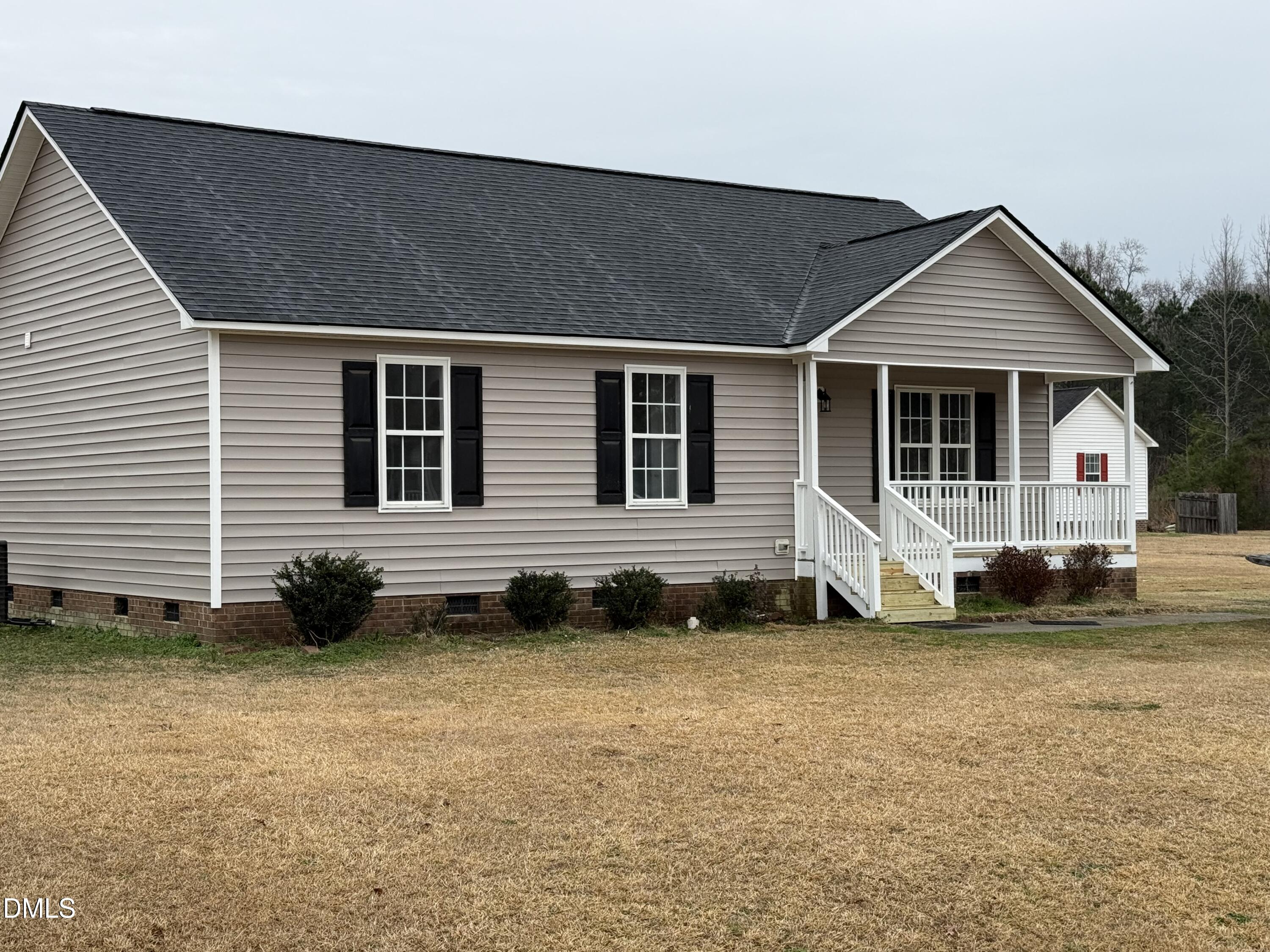 101 Copper Stone Street Smithfield, NC 27577 - Photo 3 of 32 a view of a house with a yard
