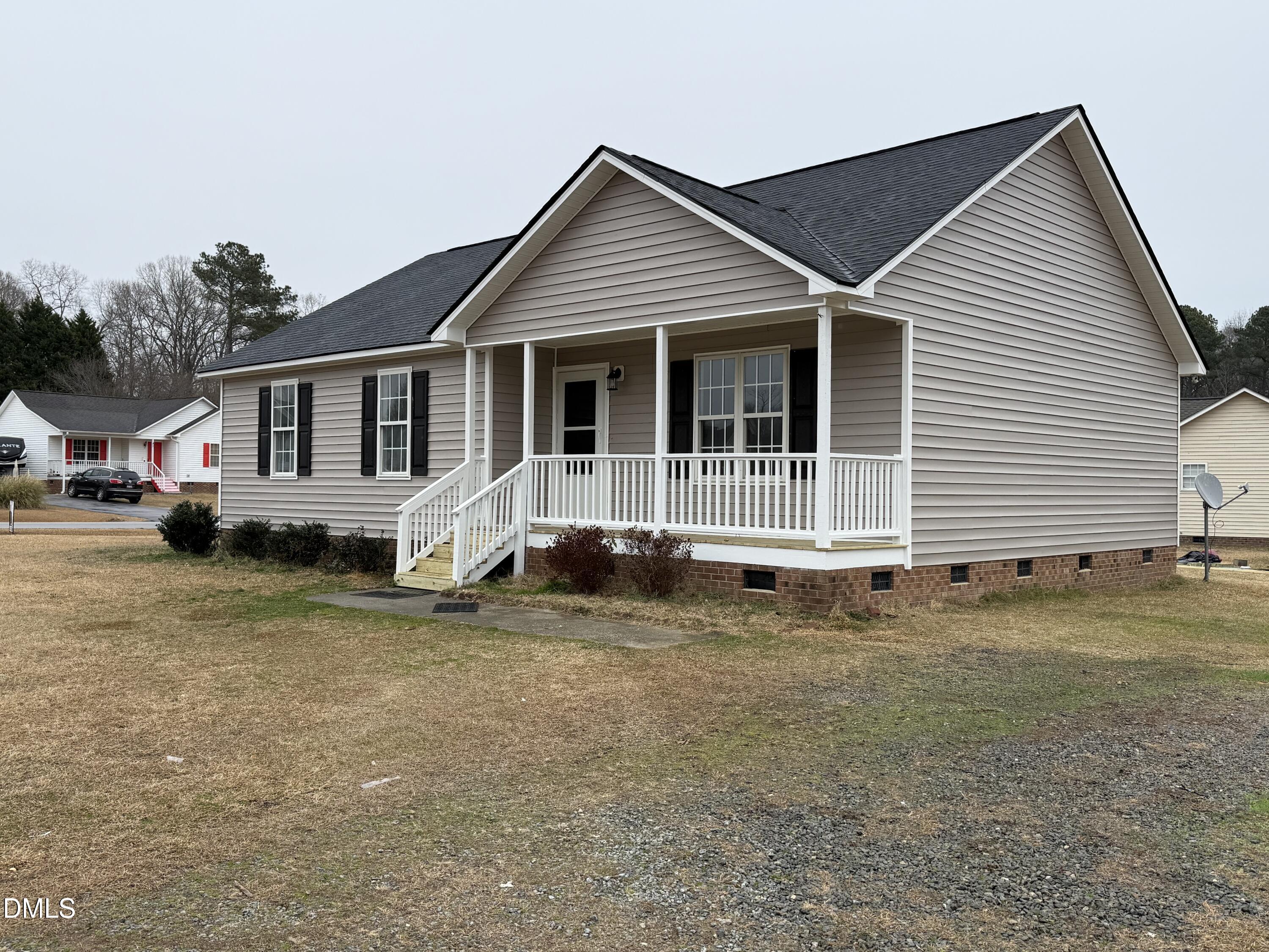 101 Copper Stone Street Smithfield, NC 27577 - Photo 10 of 32 a front view of a house with a yard