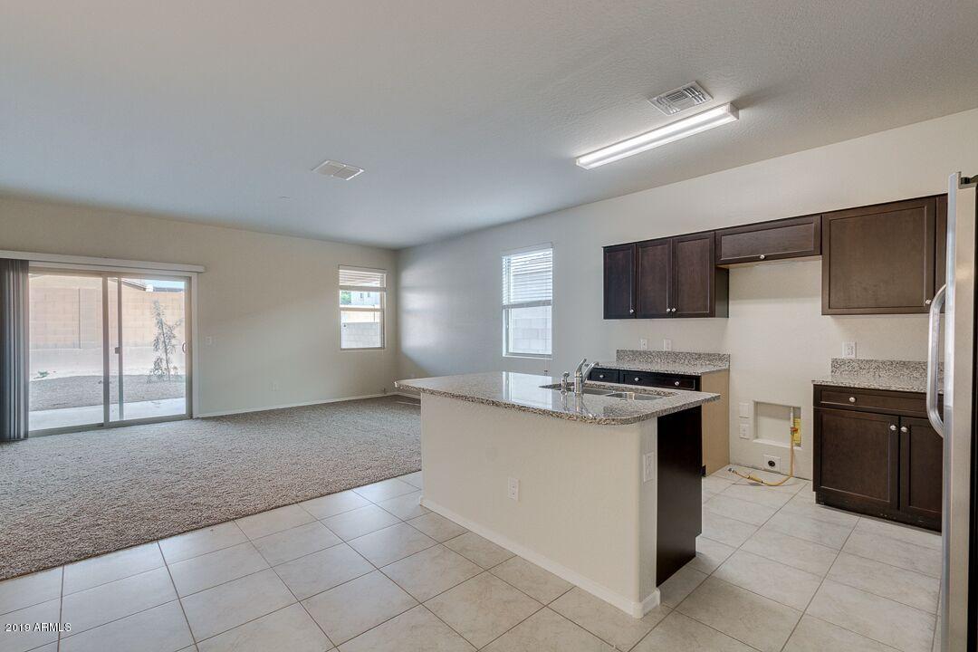 31061 West Picadilly Road Buckeye, AZ 85396 - Photo 16 of 31 kitchenandliving