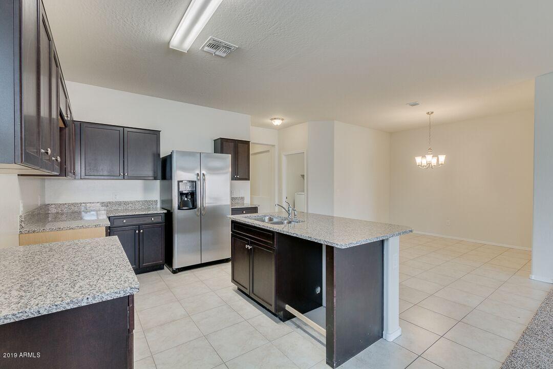 31061 West Picadilly Road Buckeye, AZ 85396 - Photo 8 of 31 diningandkitchen2