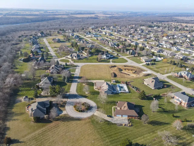 an aerial view of a house with a outdoor space