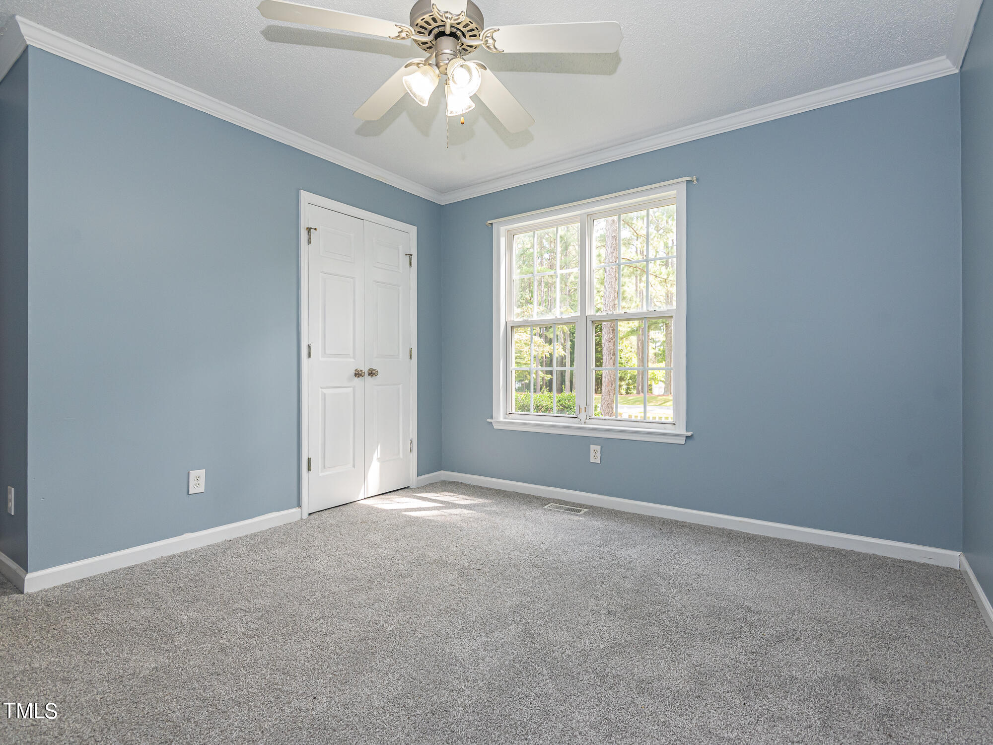 33 Troy Drive Clayton, NC 27520 - Photo 15 of 37 a view of an empty room with a window