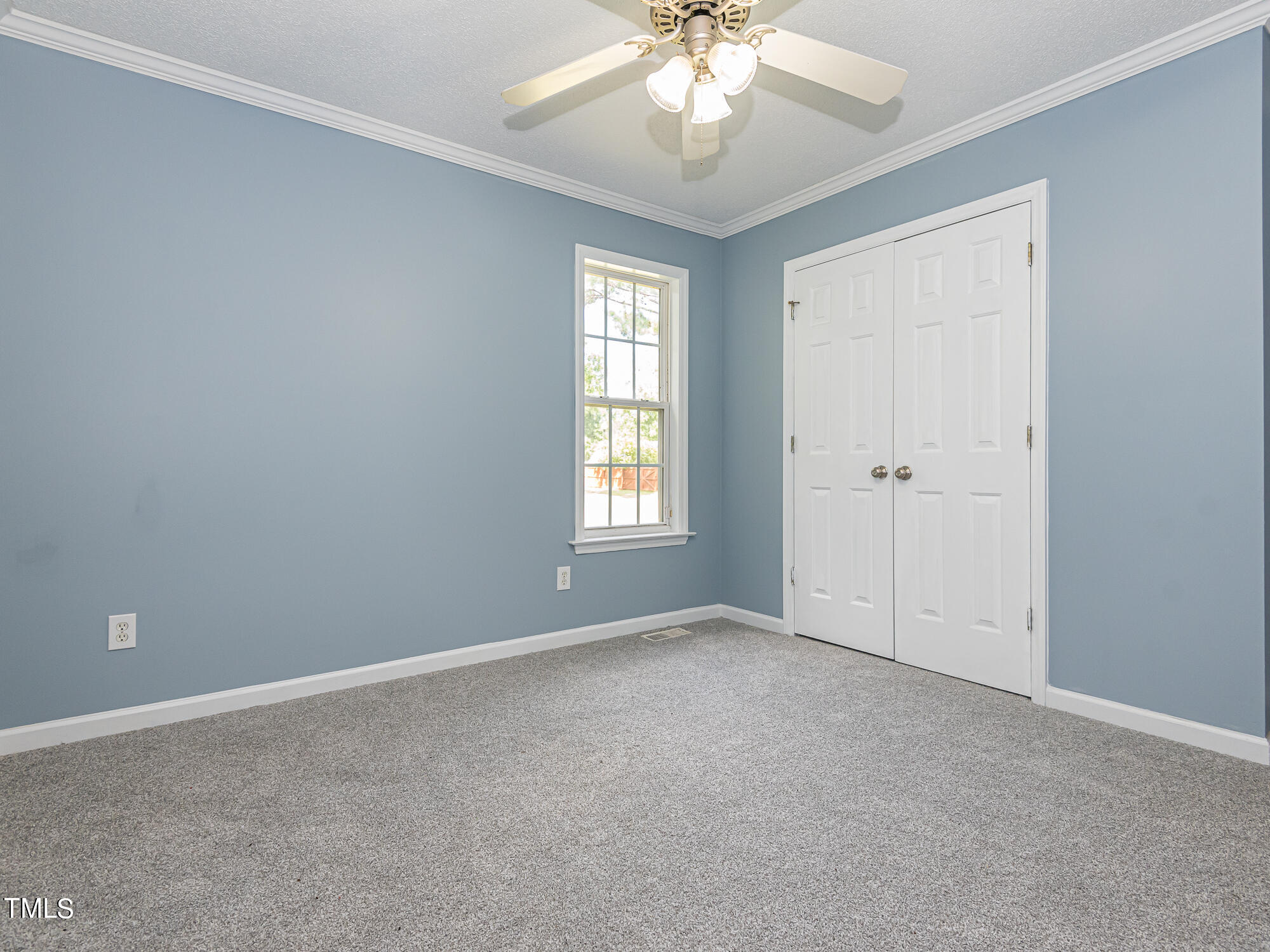 33 Troy Drive Clayton, NC 27520 - Photo 16 of 37 a view of an empty room with a window