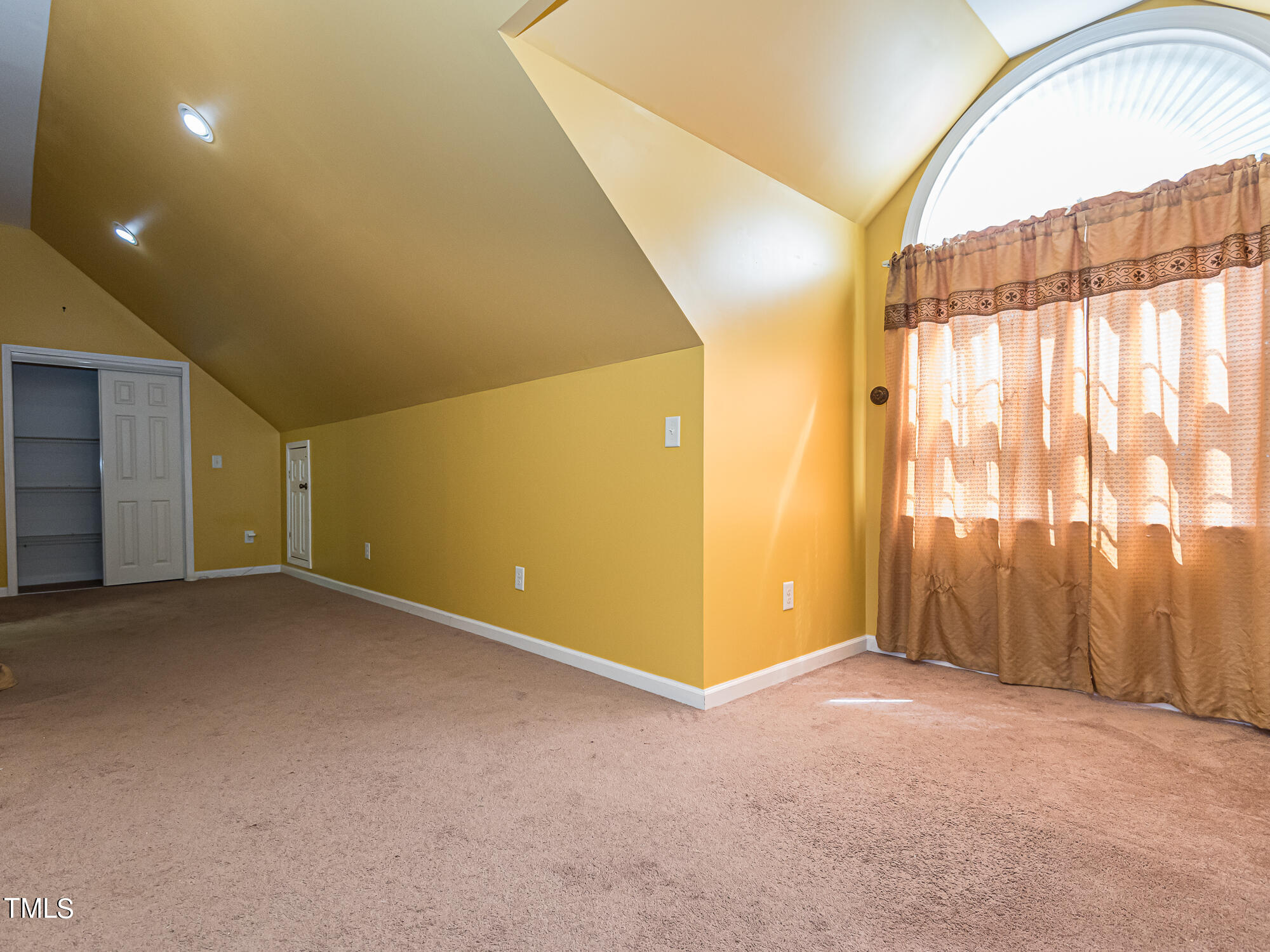 33 Troy Drive Clayton, NC 27520 - Photo 20 of 37 an empty room with windows