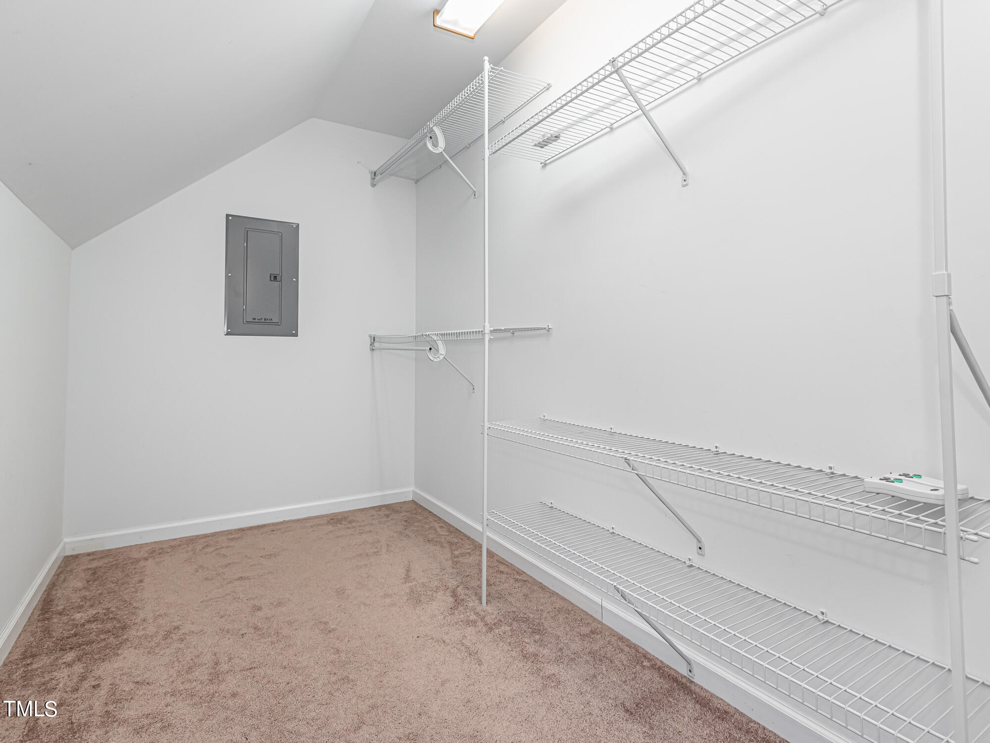 33 Troy Drive Clayton, NC 27520 - Photo 25 of 37 a view of a room with racks on the wall