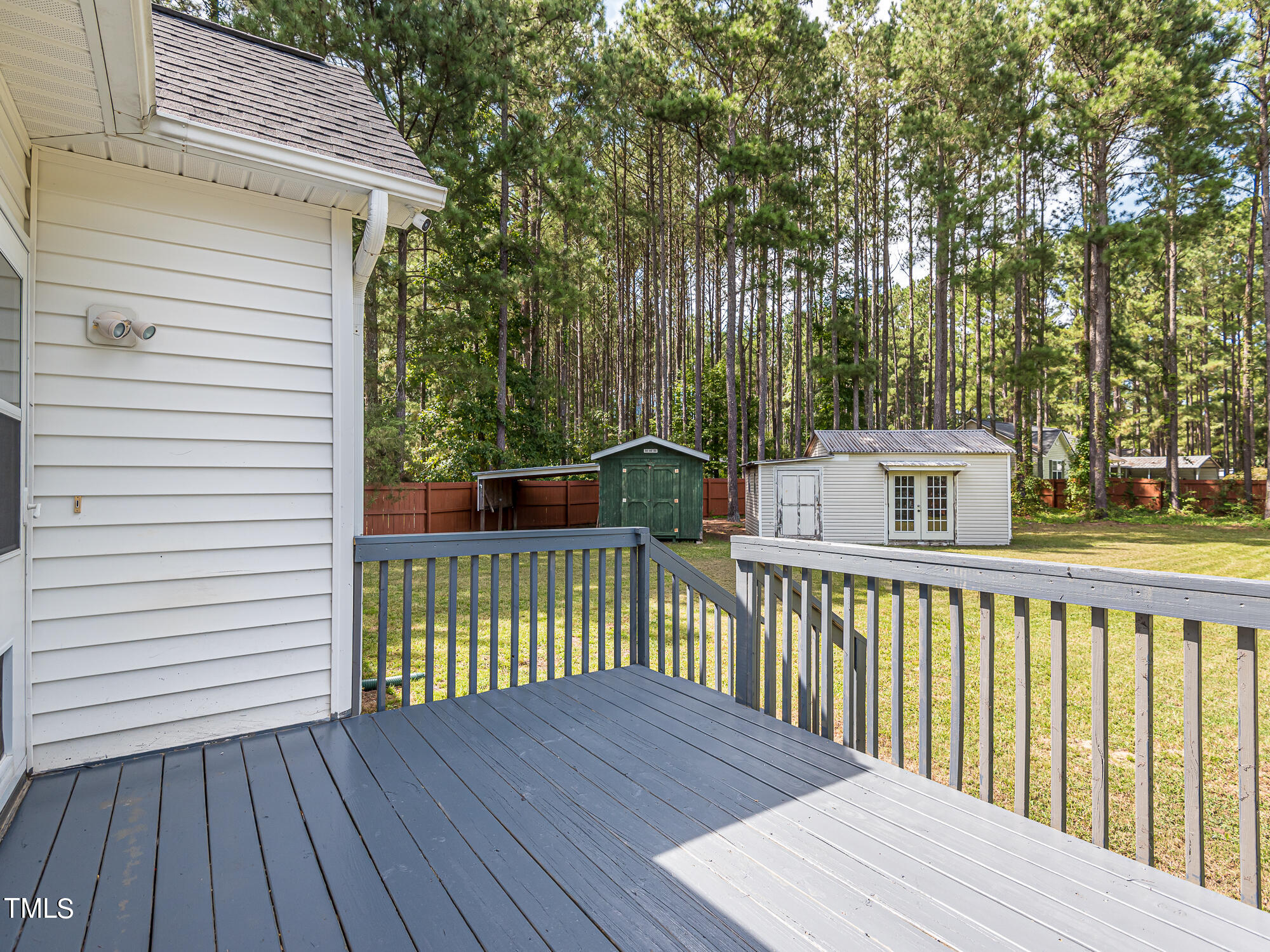 33 Troy Drive Clayton, NC 27520 - Photo 30 of 37 a view of a wooden deck