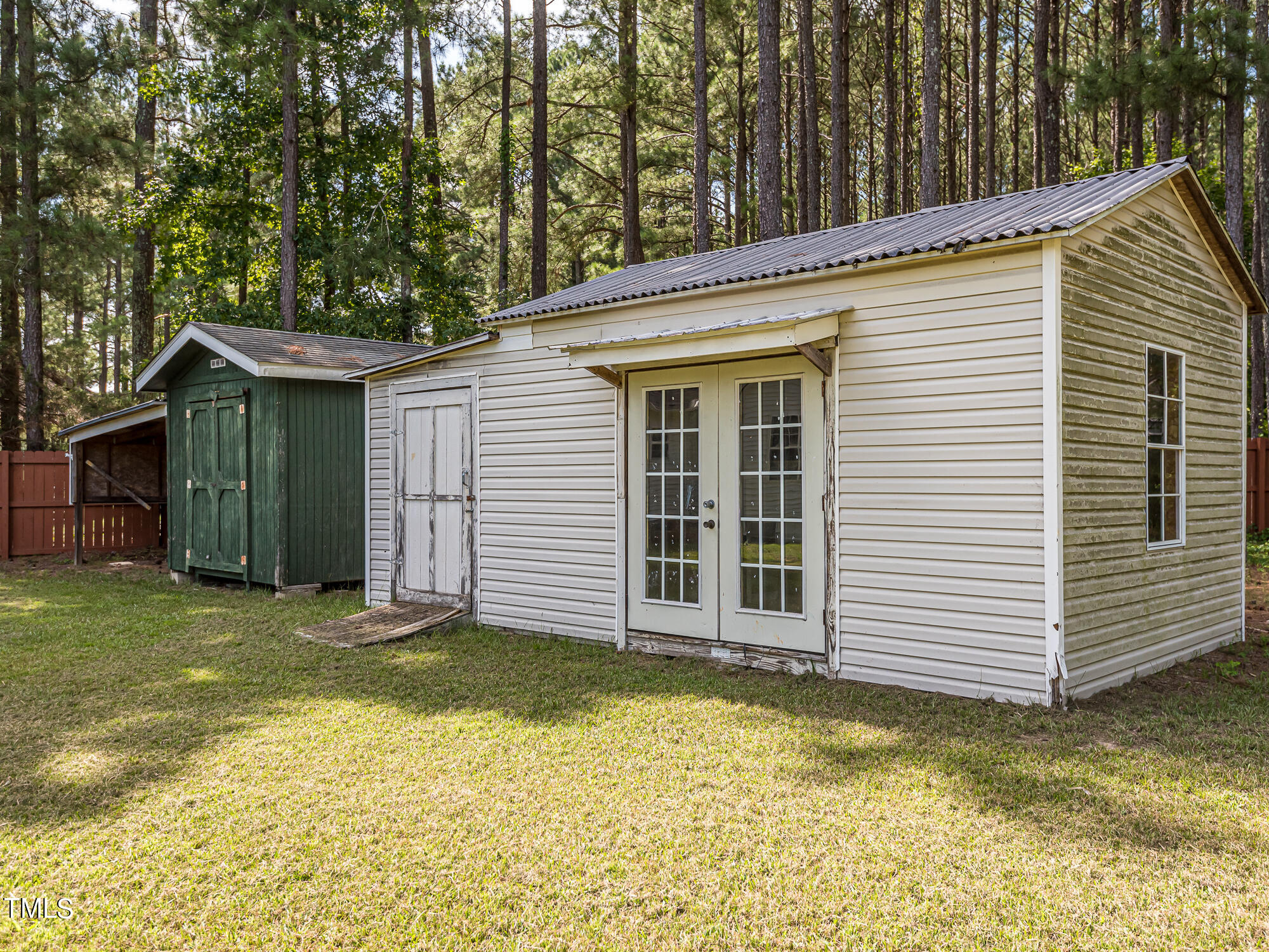 33 Troy Drive Clayton, NC 27520 - Photo 32 of 37 a view of a house with a backyard