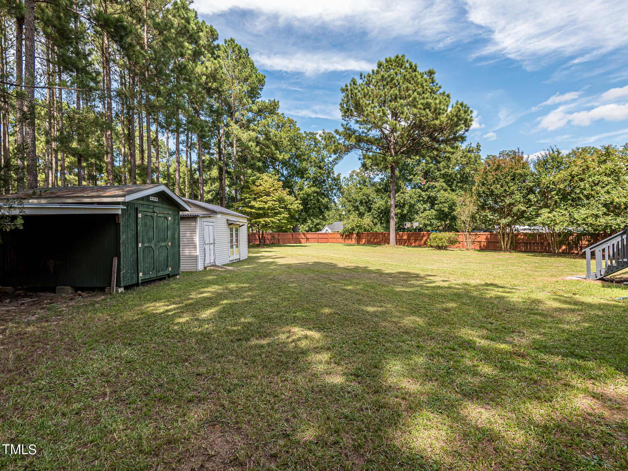 33 Troy Drive Clayton, NC 27520 - Photo 34 of 37 a view of a house with a yard