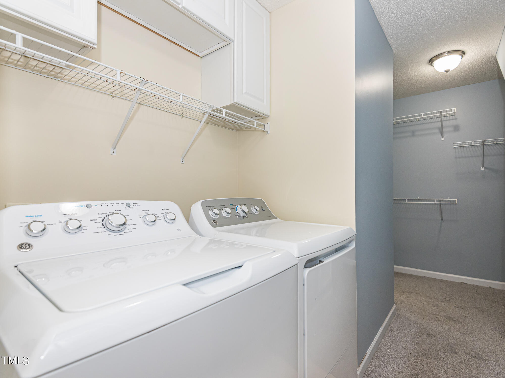 33 Troy Drive Clayton, NC 27520 - Photo 10 of 37 a utility room with dryer and washer