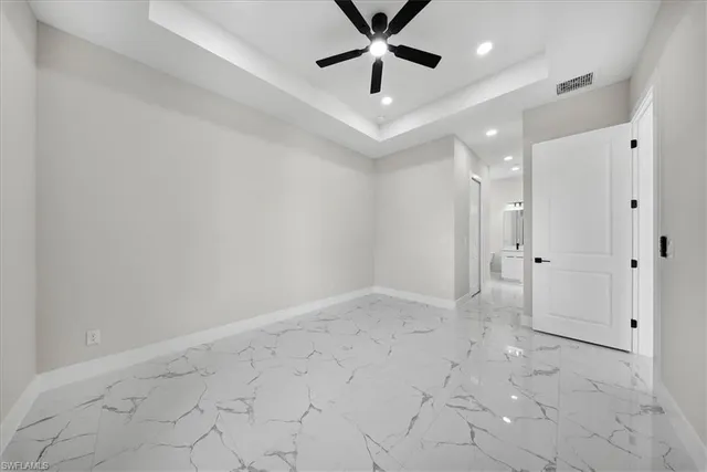 a bathroom with a sink a toilet a shower and a mirror