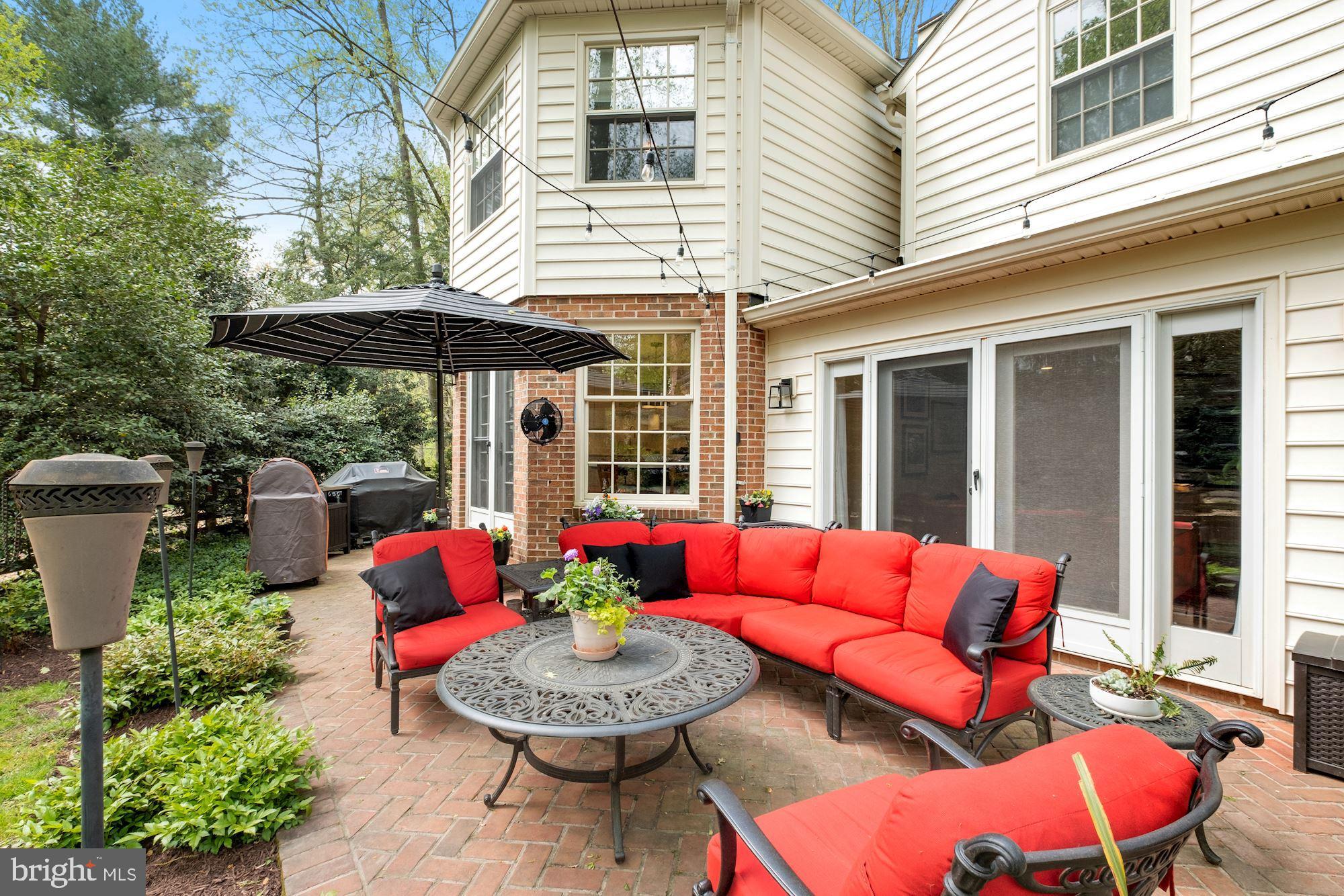 11833 Hunting Ridge Court Potomac, MD 20854 - Photo 18 of 50 Cozy brick paver patio off family room and kitchen