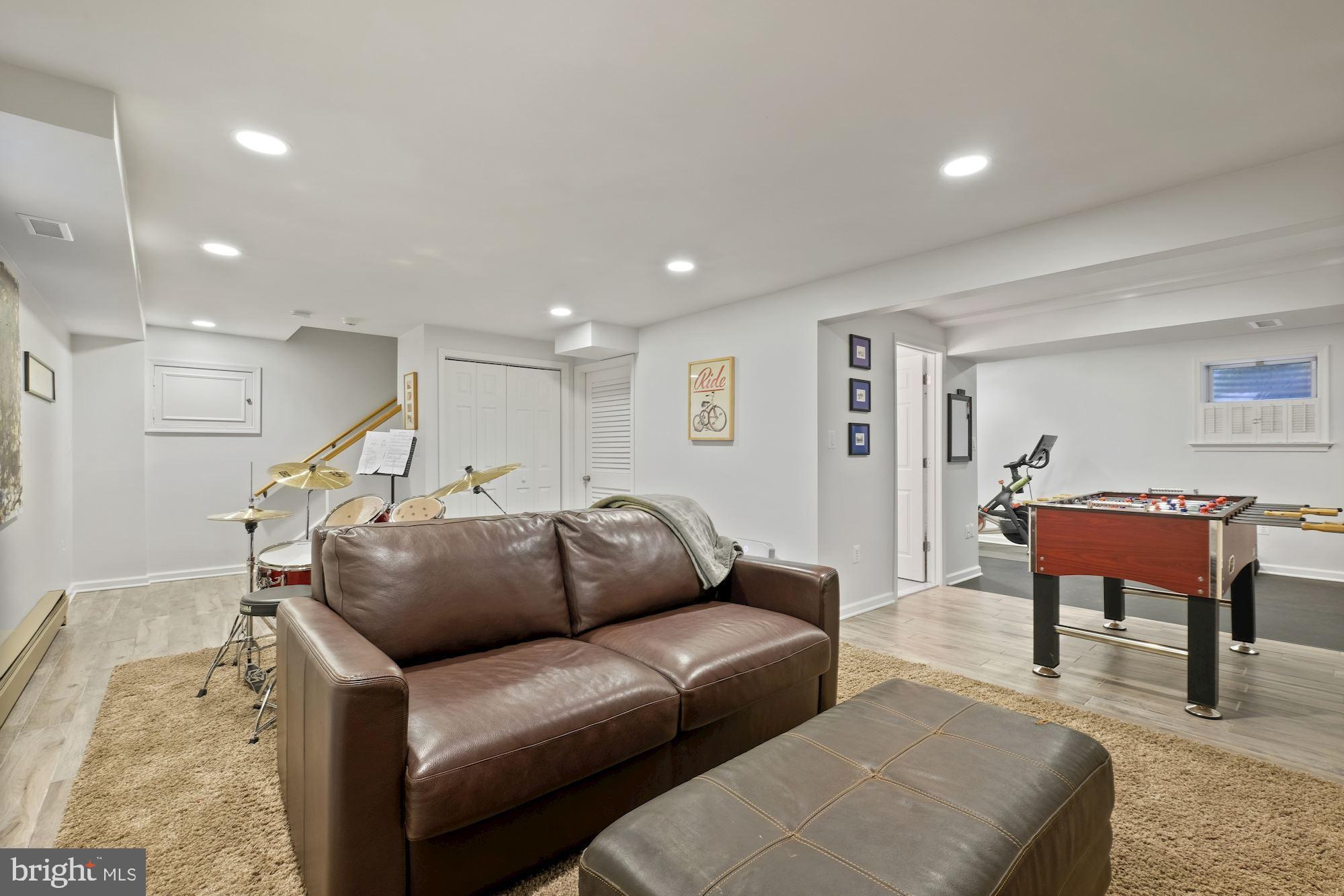 11833 Hunting Ridge Court Potomac, MD 20854 - Photo 38 of 50 Lower Level Recreation Room w/ new tile flooring