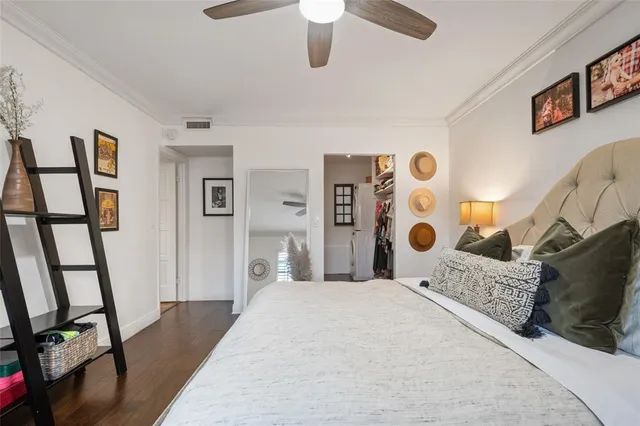 a bathroom with a granite countertop sink mirror and toilet