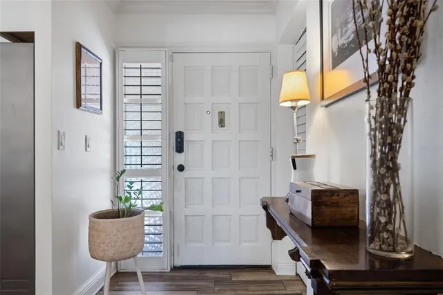 a kitchen with stainless steel appliances a refrigerator and a stove top oven