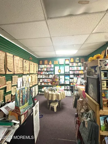 a room with lots of furniture and a large window