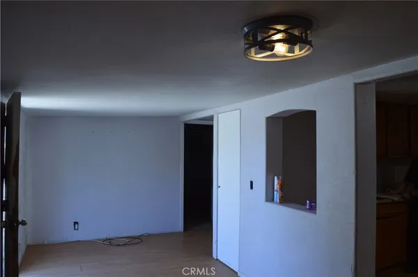 a view of a room with rack on the wall