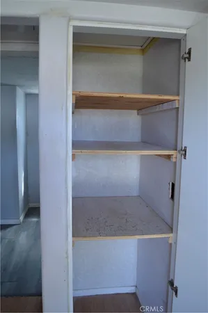 a view of an entryway with a hallway