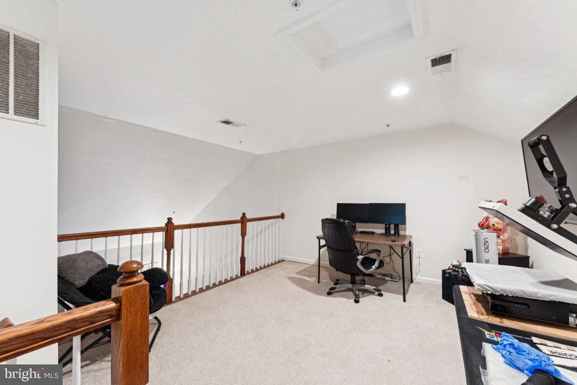 2608 St Marys View Road Accokeek, MD 20607 - Photo 18 of 25 a bedroom with furniture and a flat screen tv