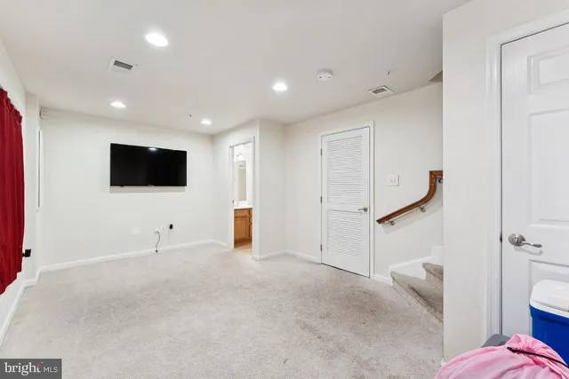 a view of a livingroom with a flat screen tv