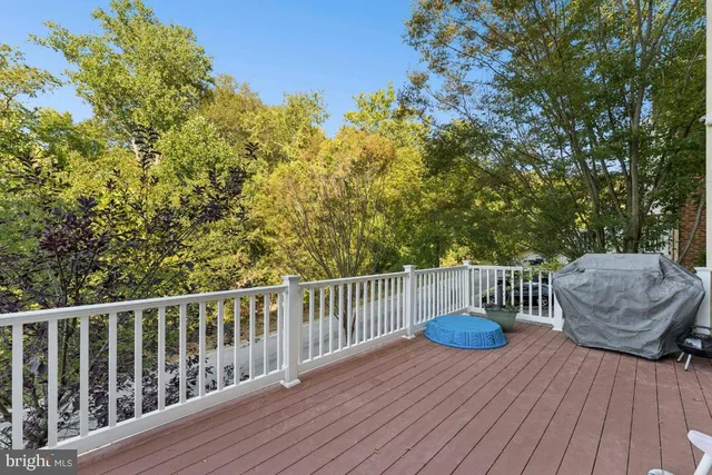 a view of a table and chair on the roof deck