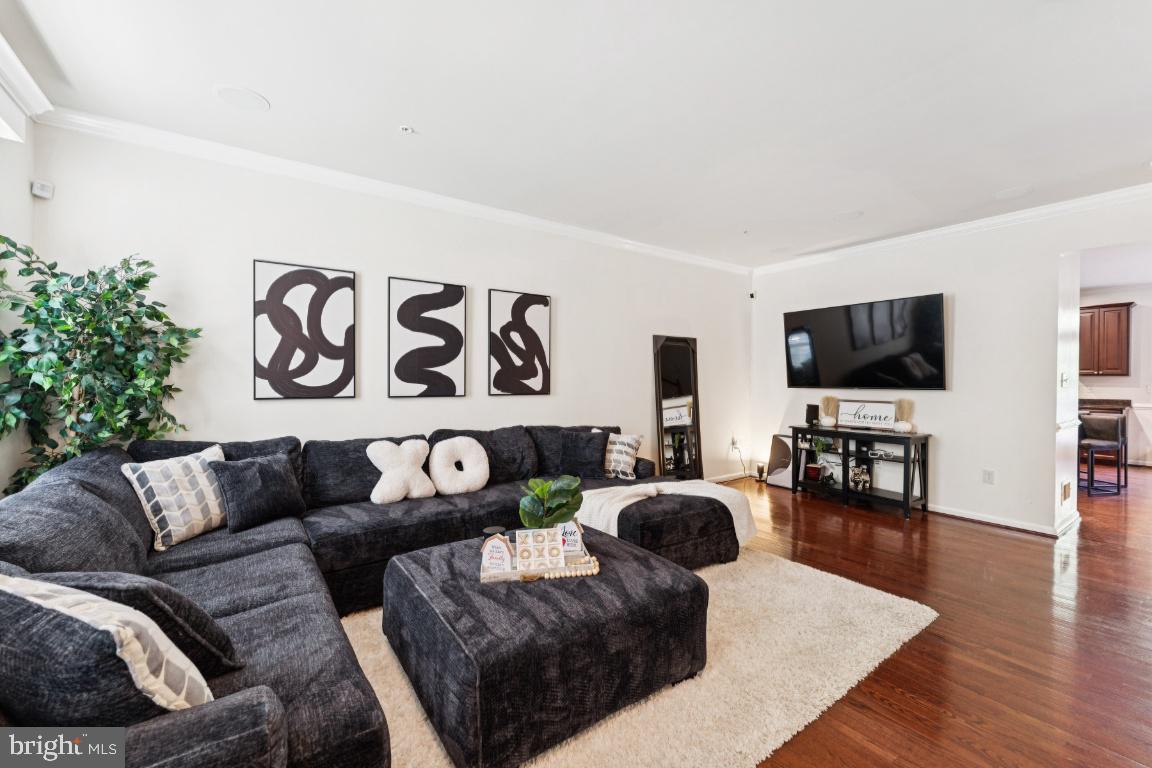 2608 St Marys View Road Accokeek, MD 20607 - Photo 5 of 26 a living room with furniture and a flat screen tv