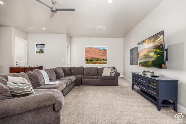 2600 Ocotillo Way, Unit 34 Santa Clara, UT 84765 - Photo 29 of 43 Living area featuring light carpet, recessed lighting, and a ceiling fan