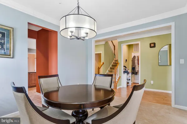 a shelf with cup and plates