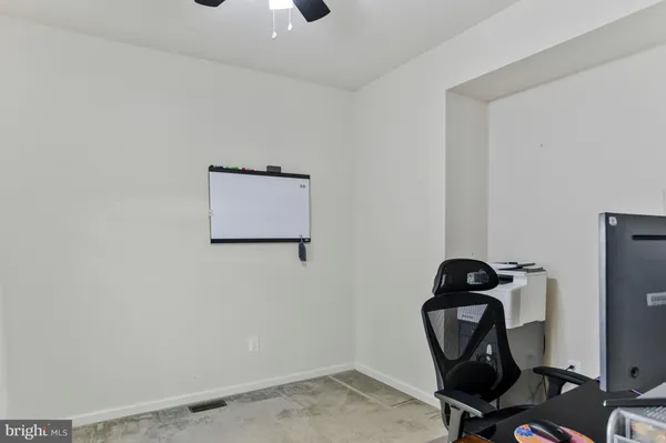 a bathroom with a double vanity sink and mirror
