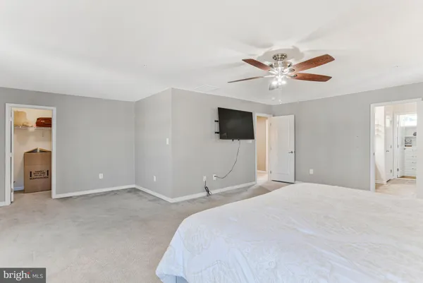 a view of storage and utility room with washer and dryer