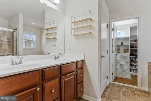 an empty room with ceiling fan