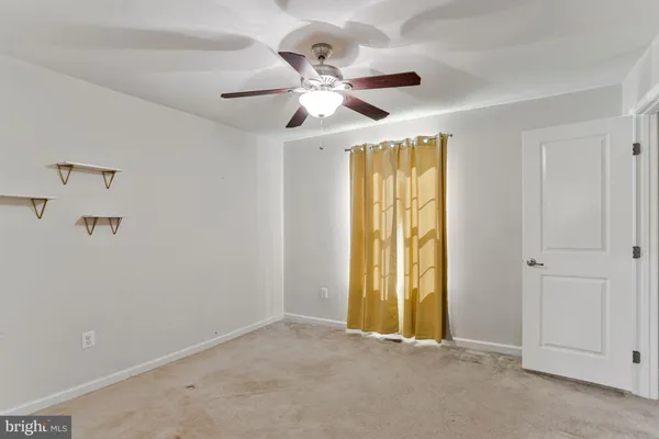 a view of a big room with closet and natural light