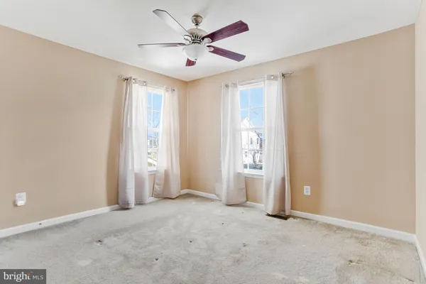 a view of a chairs and table on the deck