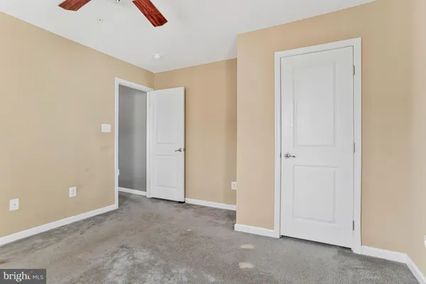 a view of a street with a building in the background