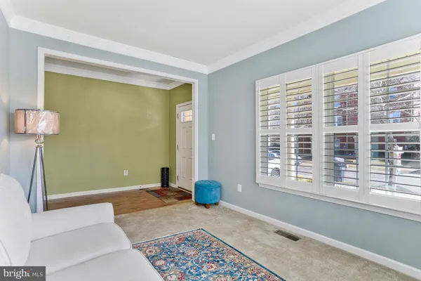 a bathroom with a sink toilet and a mirror