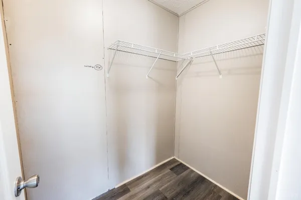 a view of a room with racks on the wall