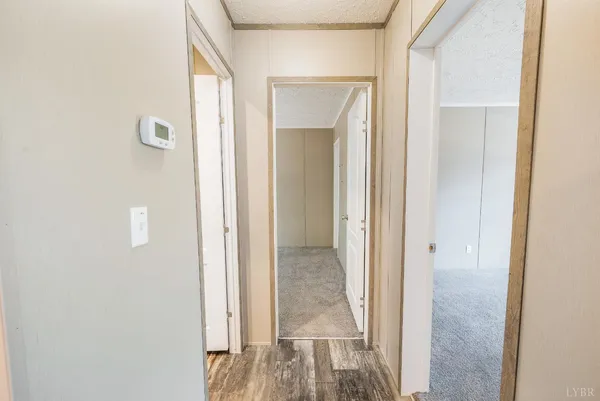 a view of a bathroom from a hallway