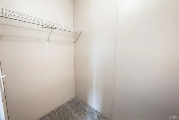 a view of a room with racks on the wall