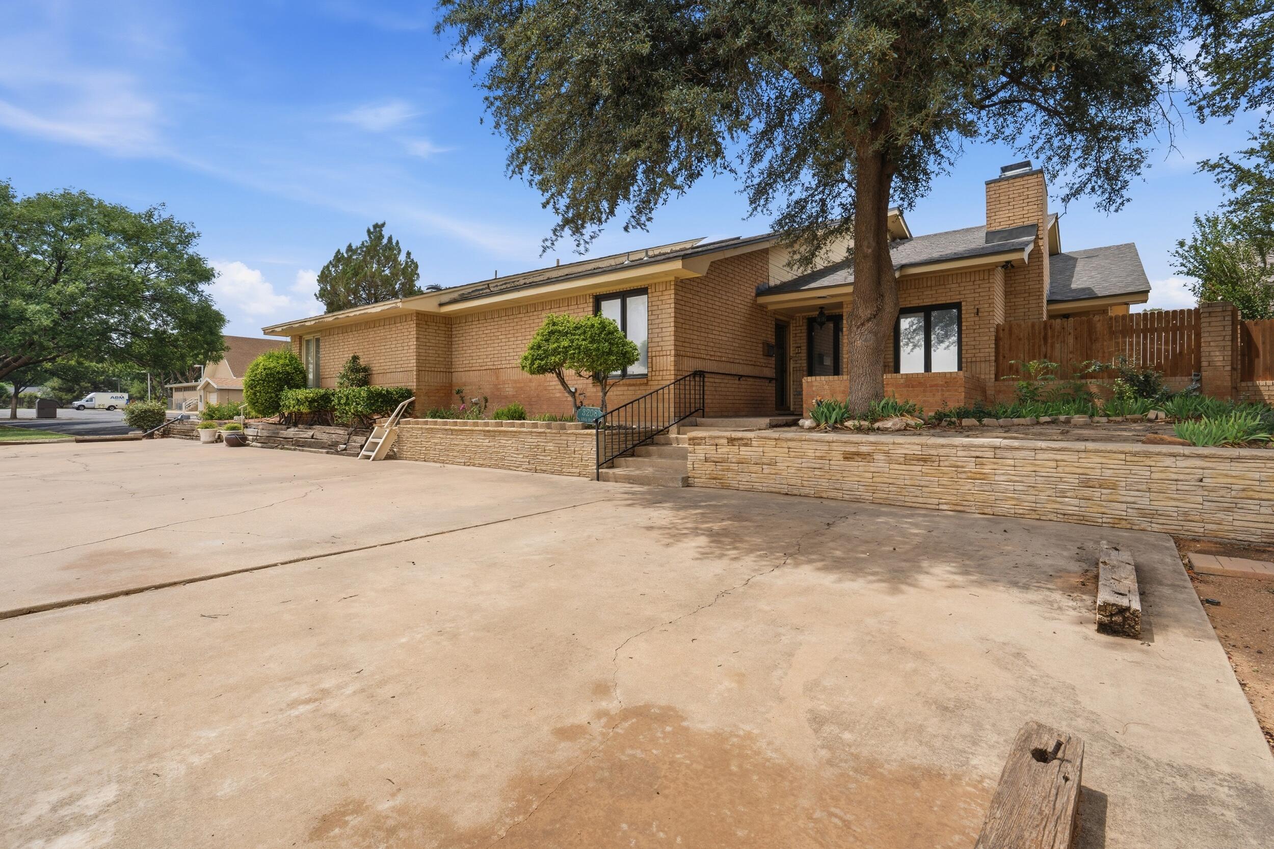 3208 59th Street Lubbock, TX 79413 - Photo 2 of 37 IMG_8800