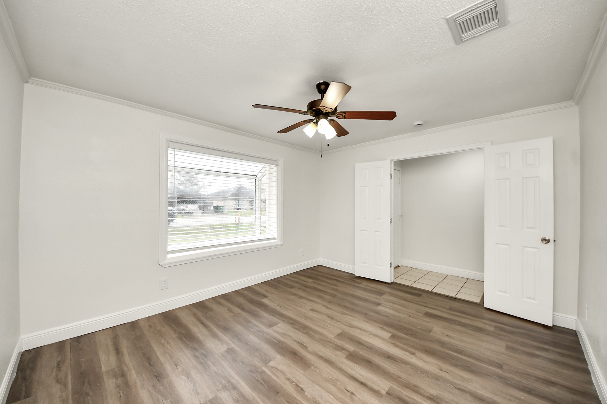 1139 Hartwick Road Houston, TX 77037 - Photo 15 of 38 a view of an empty room with a window