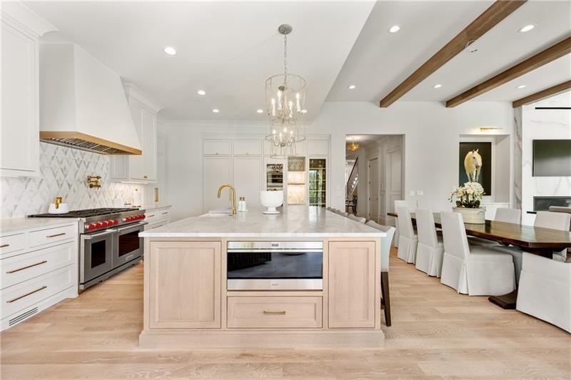 3940 Cottage Park Alpharetta, GA 30004 - Photo 18 of 76 a kitchen with stainless steel appliances granite countertop a sink stove and refrigerator