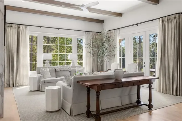 a bathroom with a glass shower door