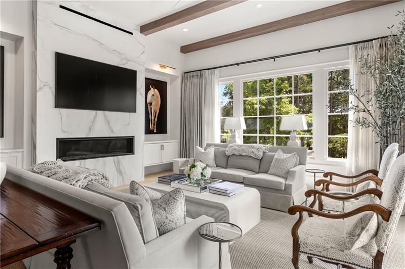 3940 Cottage Park Alpharetta, GA 30004 - Photo 26 of 76 a living room with furniture and a flat screen tv