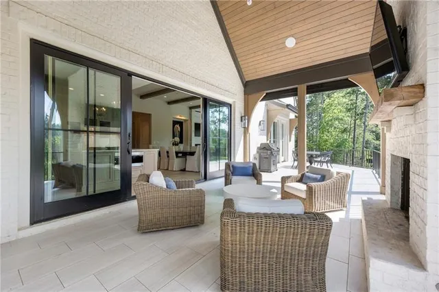 a bathroom with a shower and a sink