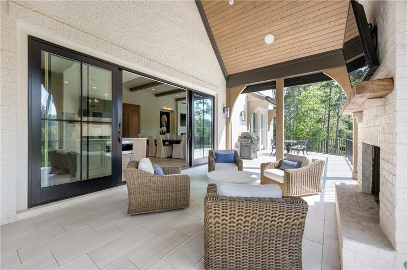 3940 Cottage Park Alpharetta, GA 30004 - Photo 29 of 76 a living room with fireplace furniture and a fireplace