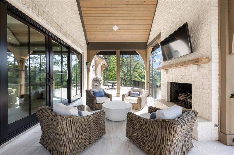 3940 Cottage Park Alpharetta, GA 30004 - Photo 31 of 76 a living room with fireplace furniture and a fireplace