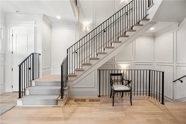 a view of a livingroom with workspace and a window