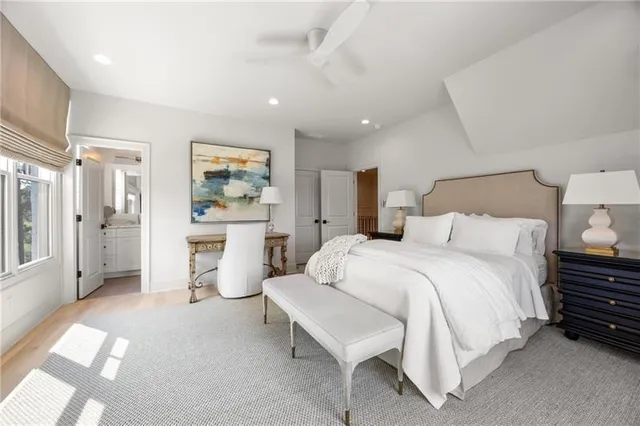 a swimming pool with outdoor seating and yard