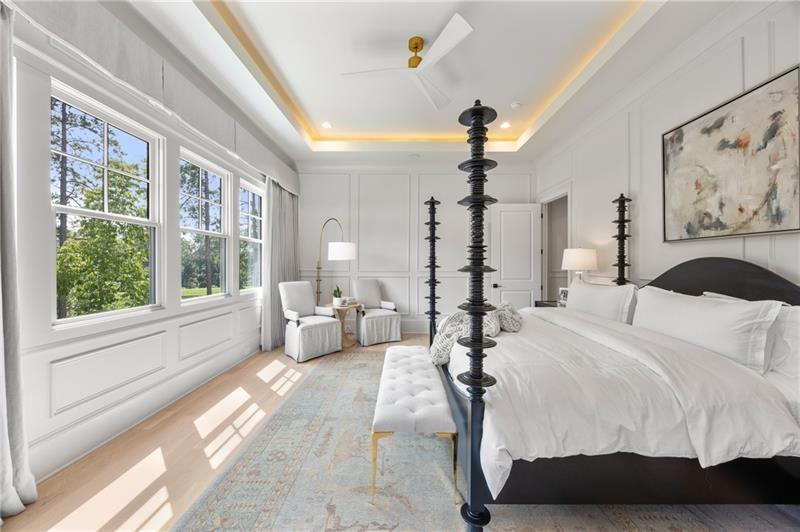 3940 Cottage Park Alpharetta, GA 30004 - Photo 6 of 76 a spacious bedroom with a bed and a large window