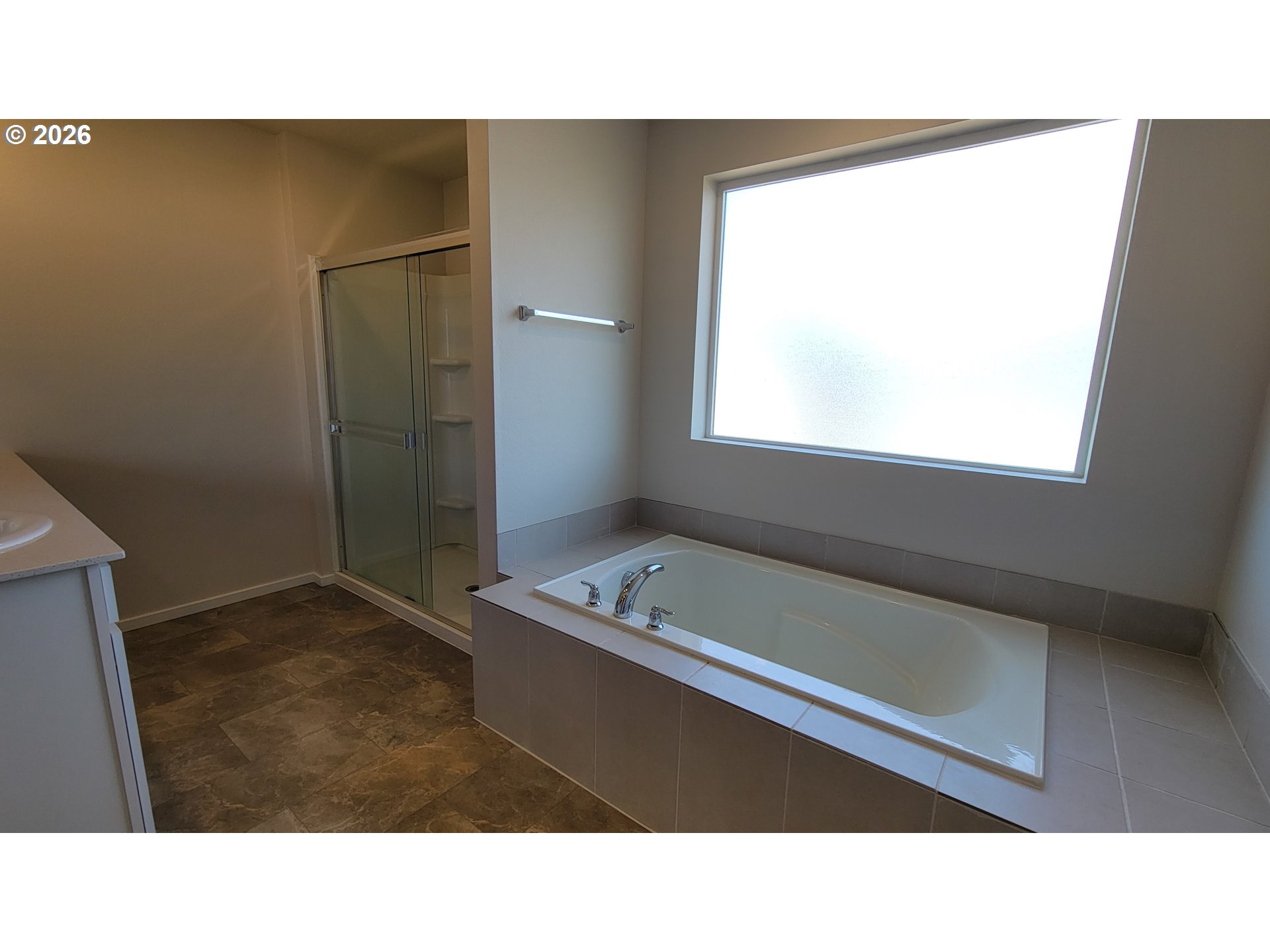 2960 V Street Springfield, OR 97477 - Photo 12 of 27 a bathroom with a tub sink and mirror